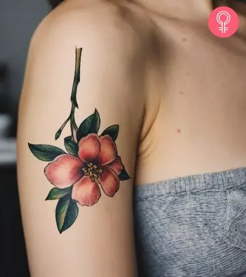 A rose tattoo on a woman’s chest
