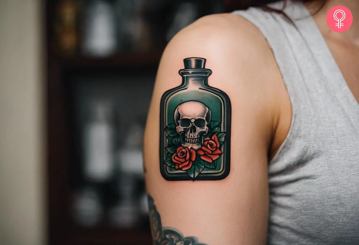 An old-school poison bottle tattoo on the upper arm of a woman