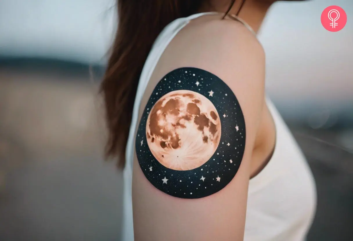 Ancient celestial tattoo on her upper arm