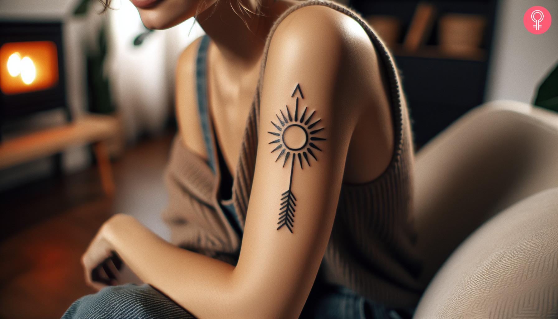 An Apollo symbol tattoo on the upper arm