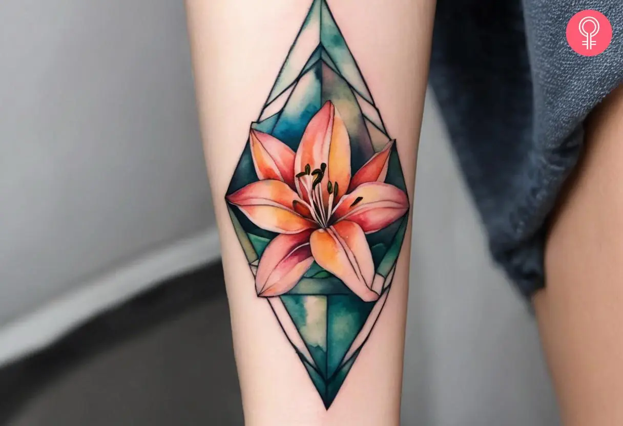 An art nouveau and art deco style lily tattoo on the forearm of a woman