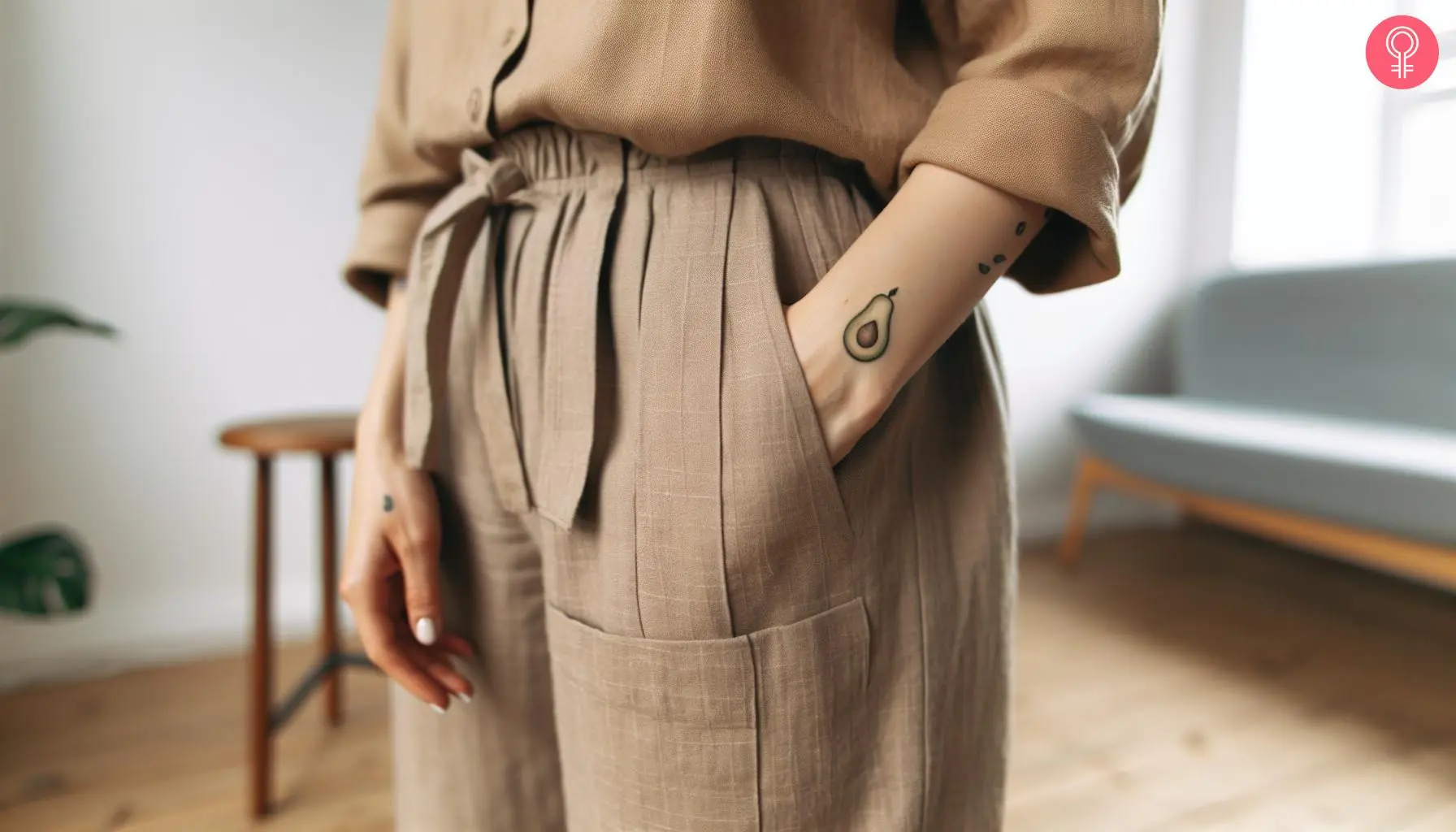 Avocado tattoo outline near the wrist of a woman