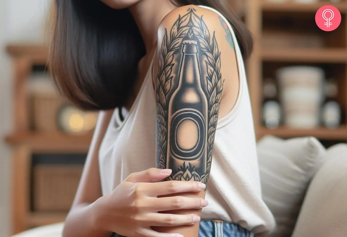 Beer bottle tattoo on a woman’s arm