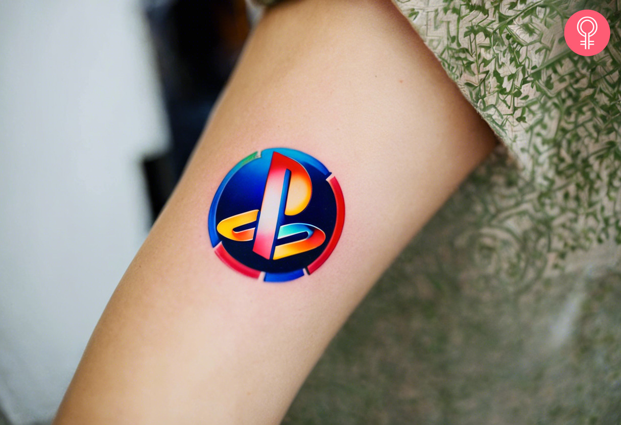 A PlayStation tattoo on a woman’s bicep