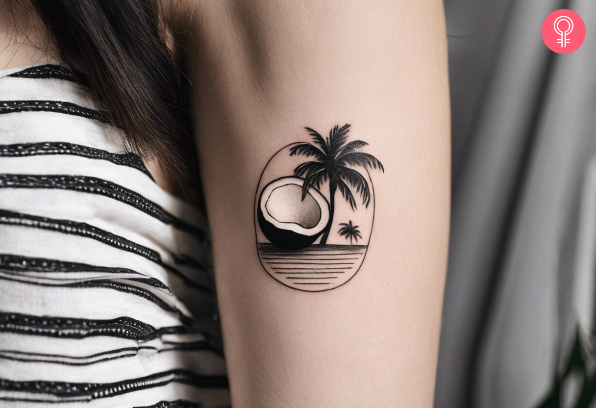 Black-and-white coconut tattoo on the bicep