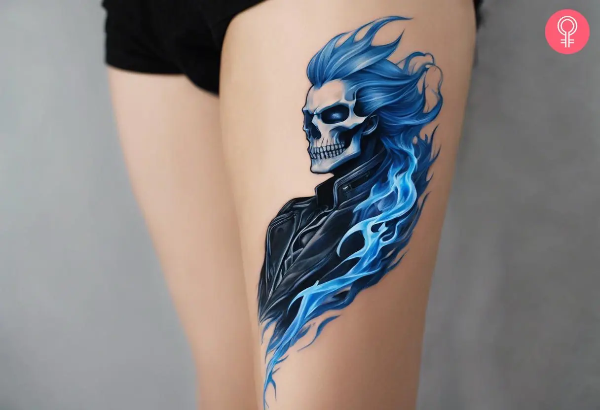 A blue Ghost Rider tattoo on the thigh