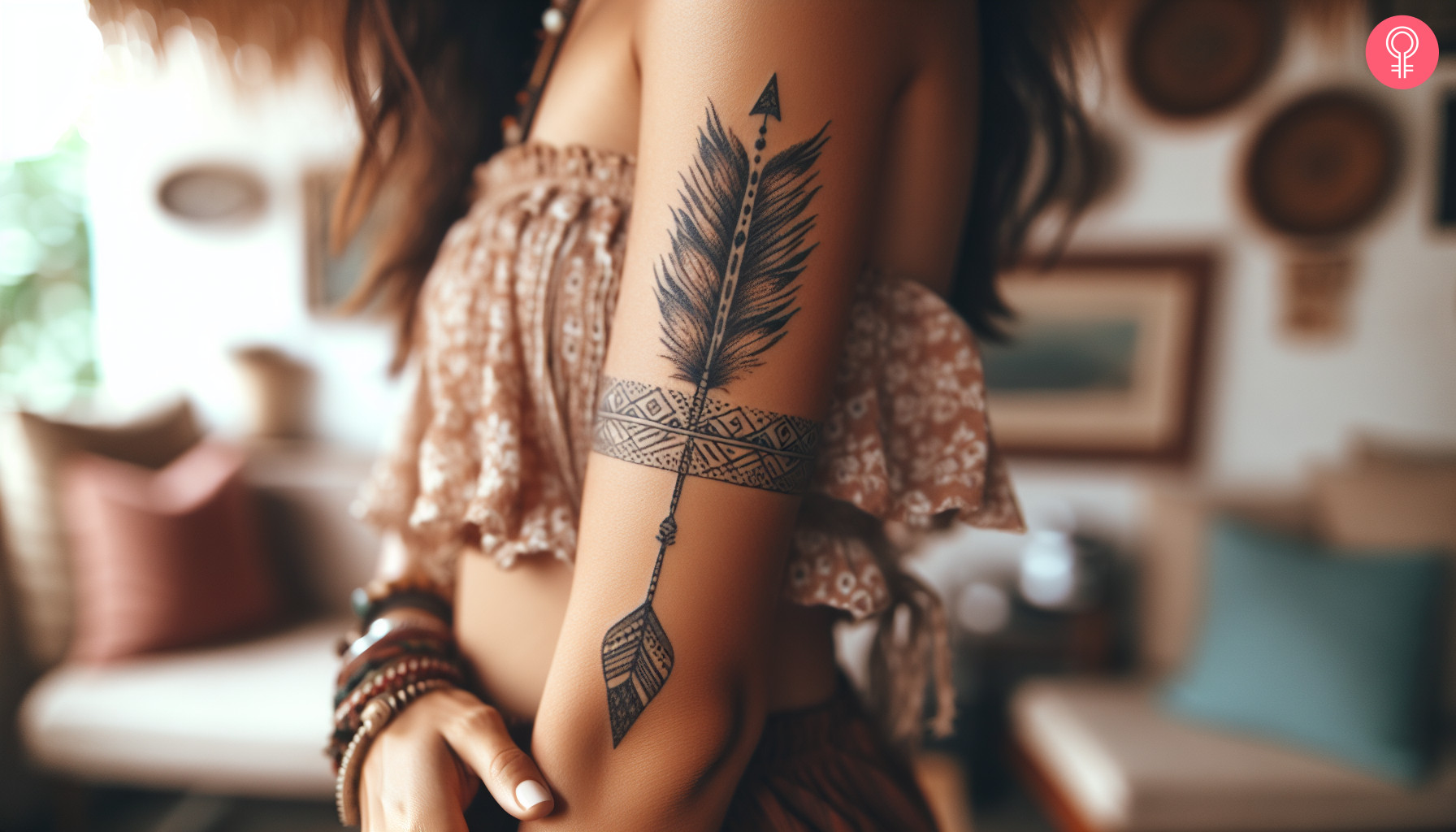 Boho arrow tattoo on the arm of a woman