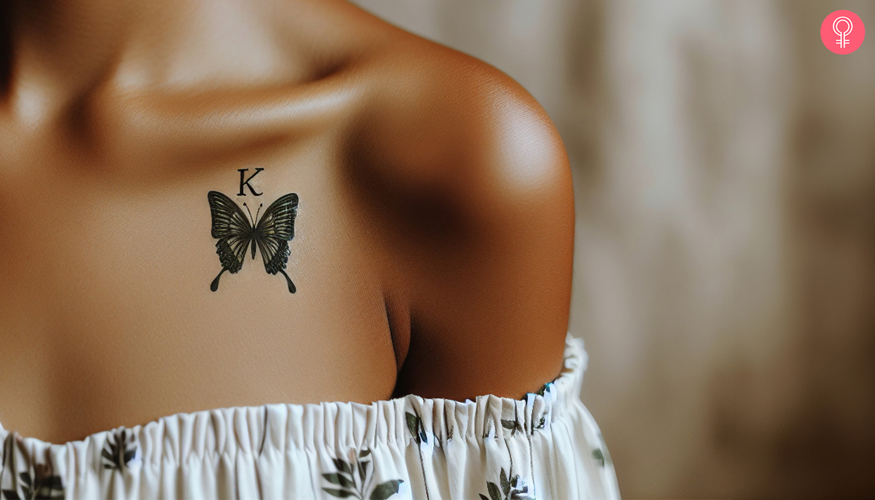 A tattoo featuring a butterfly and the letter K