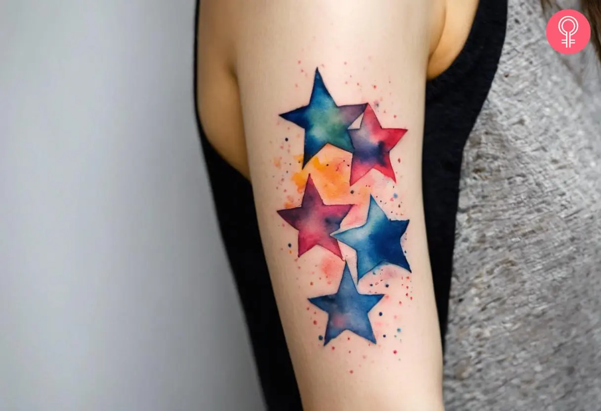 A Camino de Estrellas tattoo on a woman’s upper arm