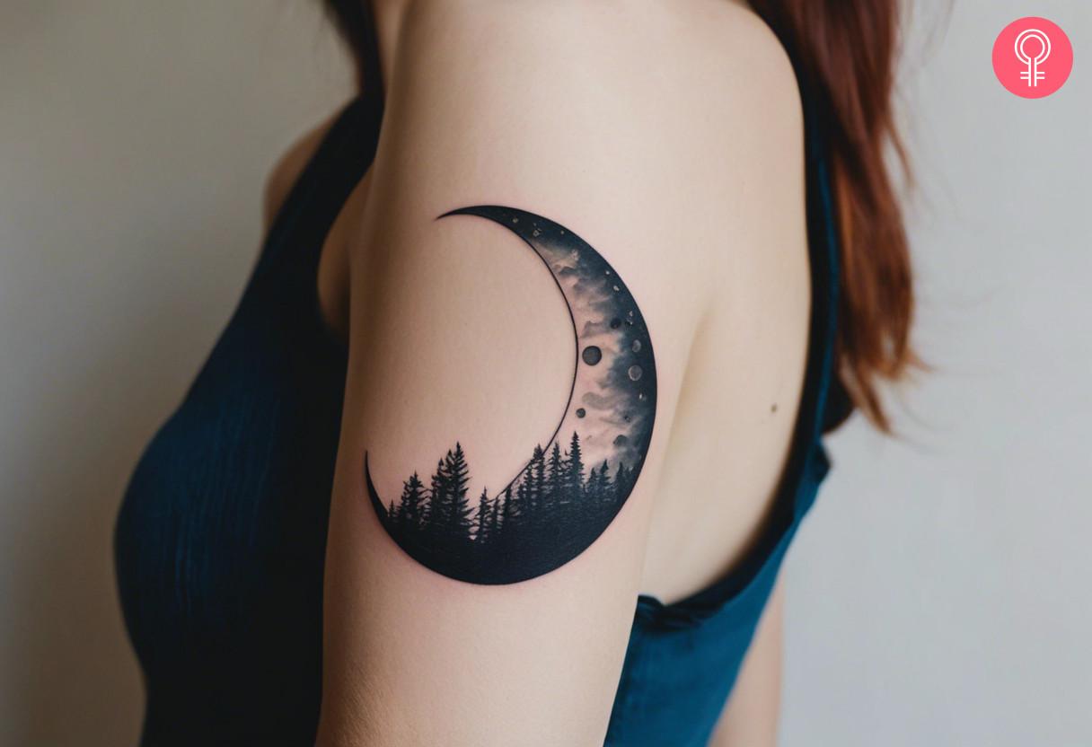 Celestial moon tattoo on her upper back