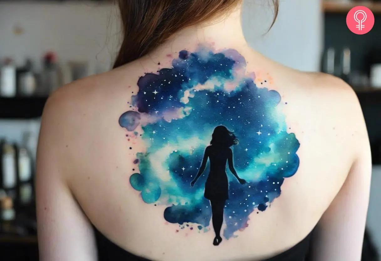 Celestial star tattoo on her upper back