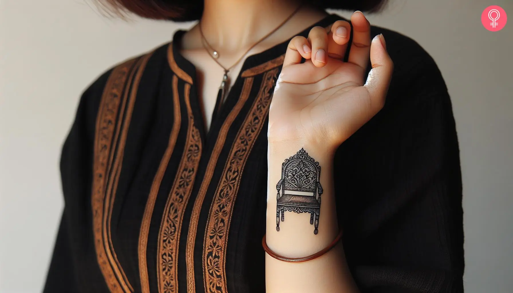 Woman with chair tattoo on her wrist