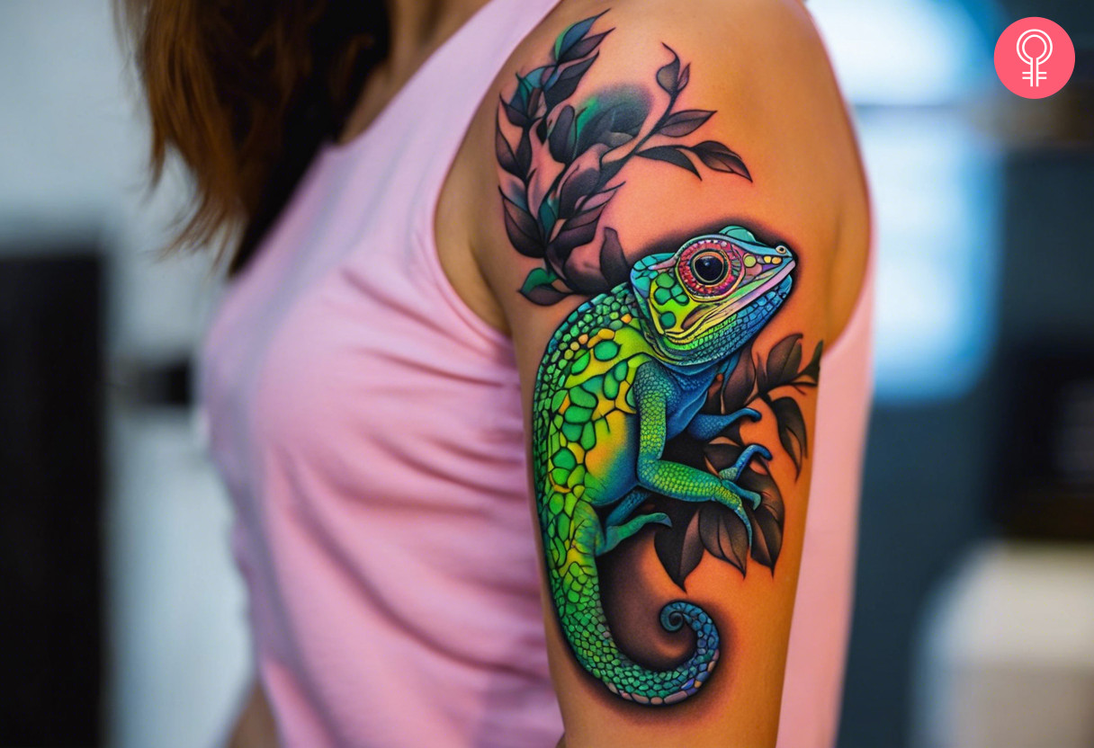 A black light chameleon tattoo on a woman’s arm