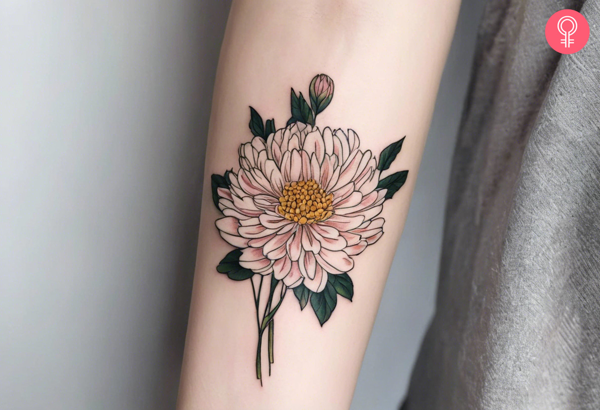 A colorful chrysanthemum inked on the forearm