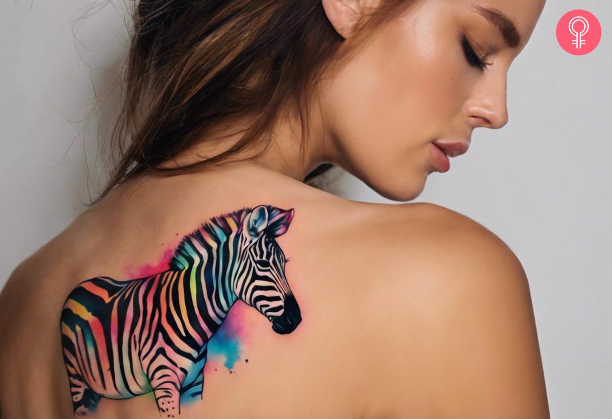 A colorful zebra tattoo design on the shoulder