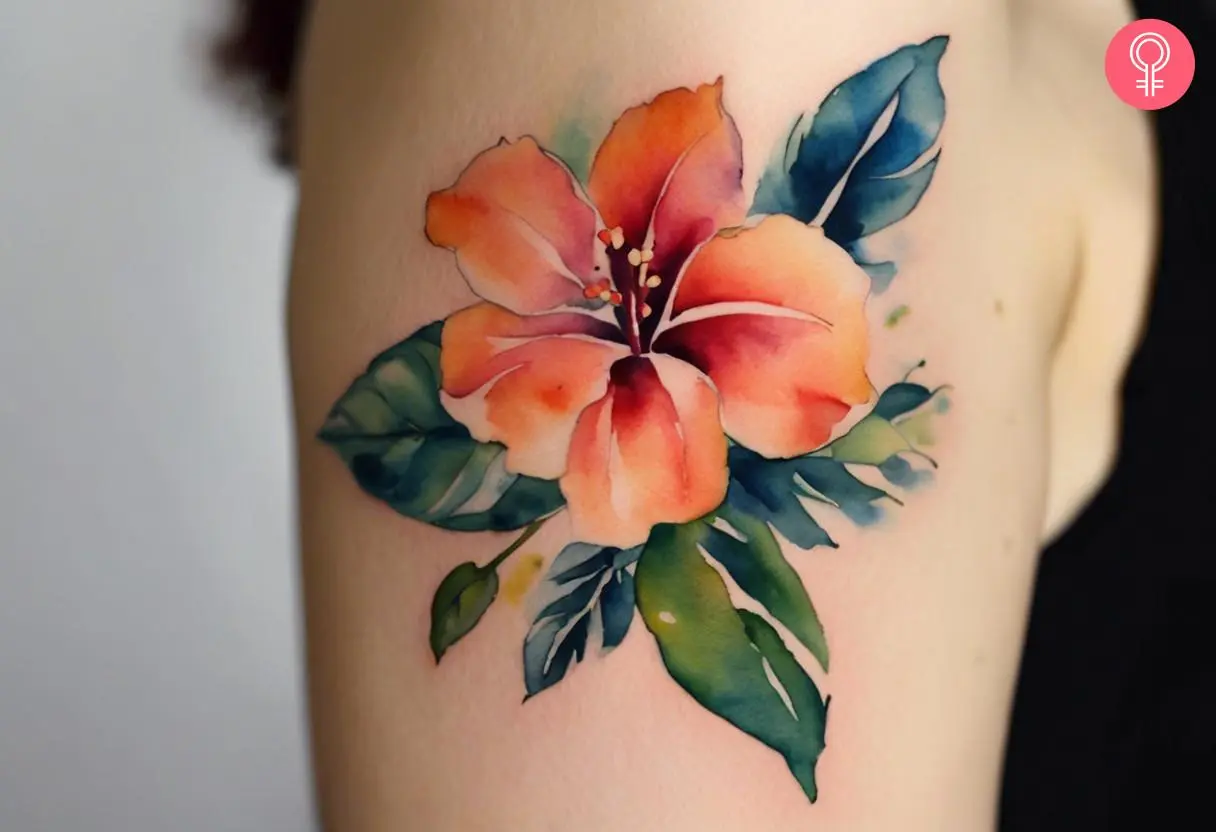 Cuban flower tattoo on the upper arm of a woman