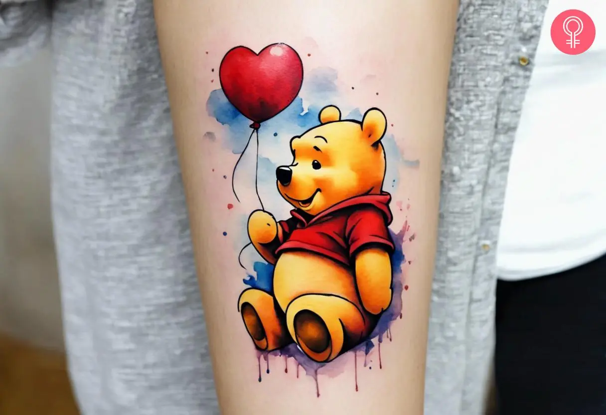 Cute Winnie the Pooh tattoo on the forearm