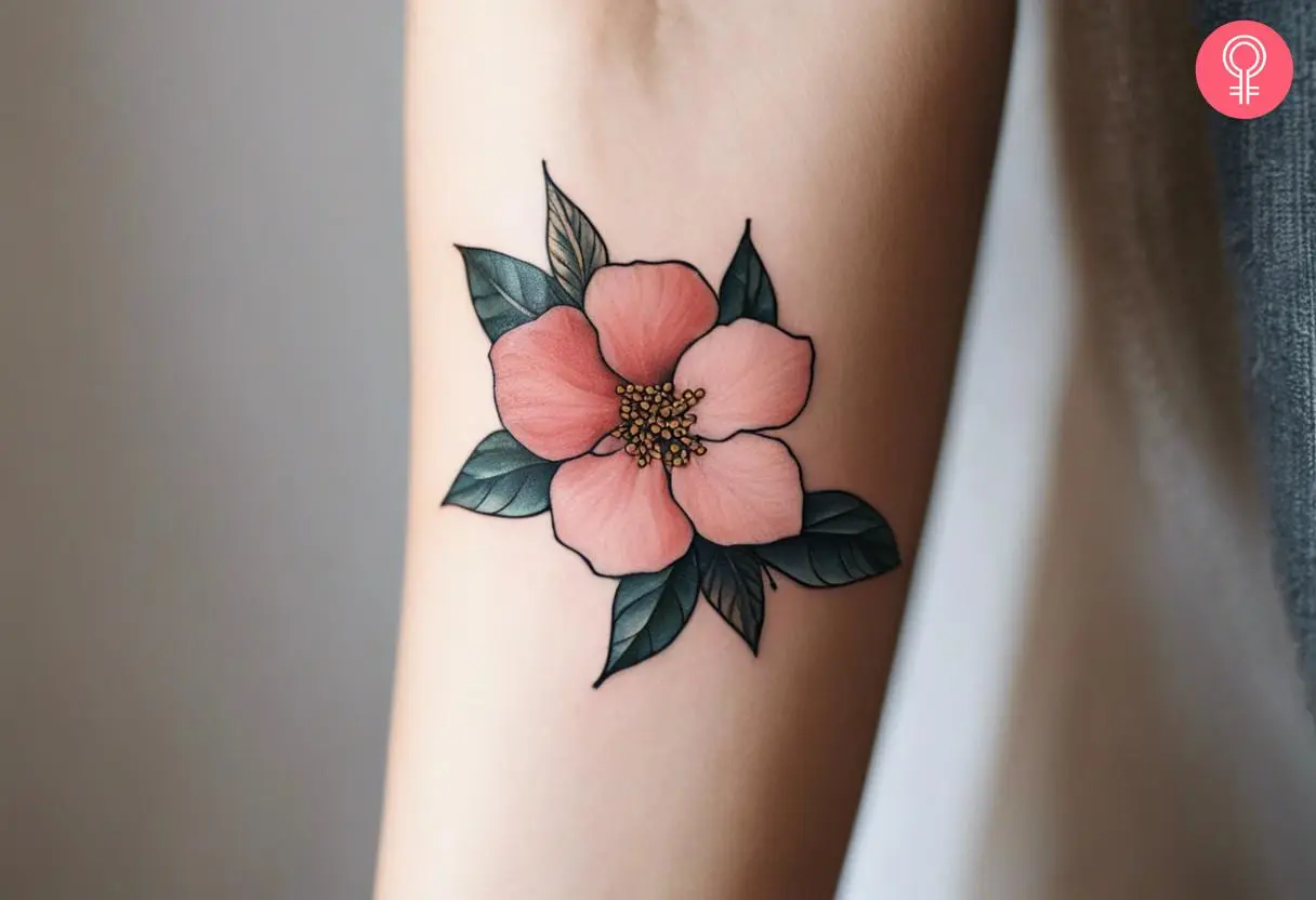 A desert rose tattoo inked on the forearm