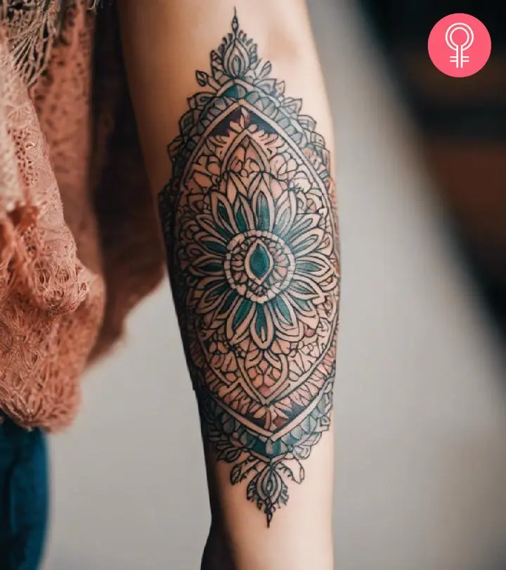 Boho tattoo design on the forearm of a woman