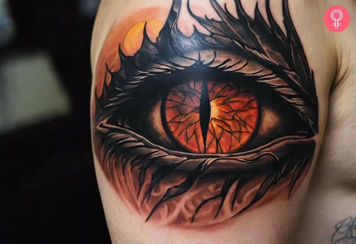 Eye of sauron tattoo on the upper arm