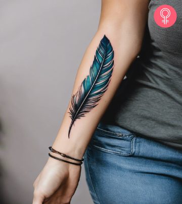 A raven tattoo on the upper arm