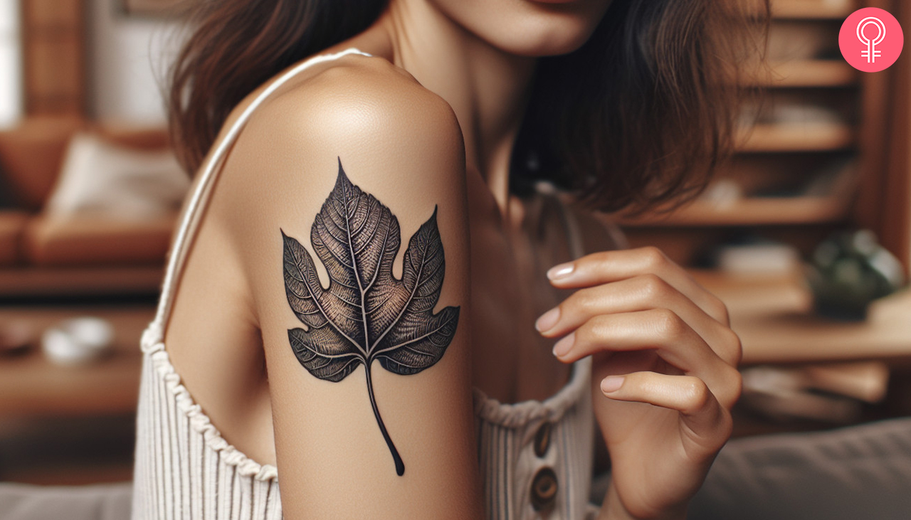 Fig leaf tattoo on the upper arm