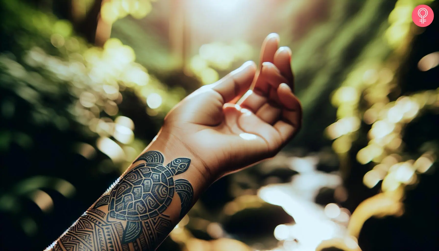 A woman with a Fijian turtle tattoo on her wrist