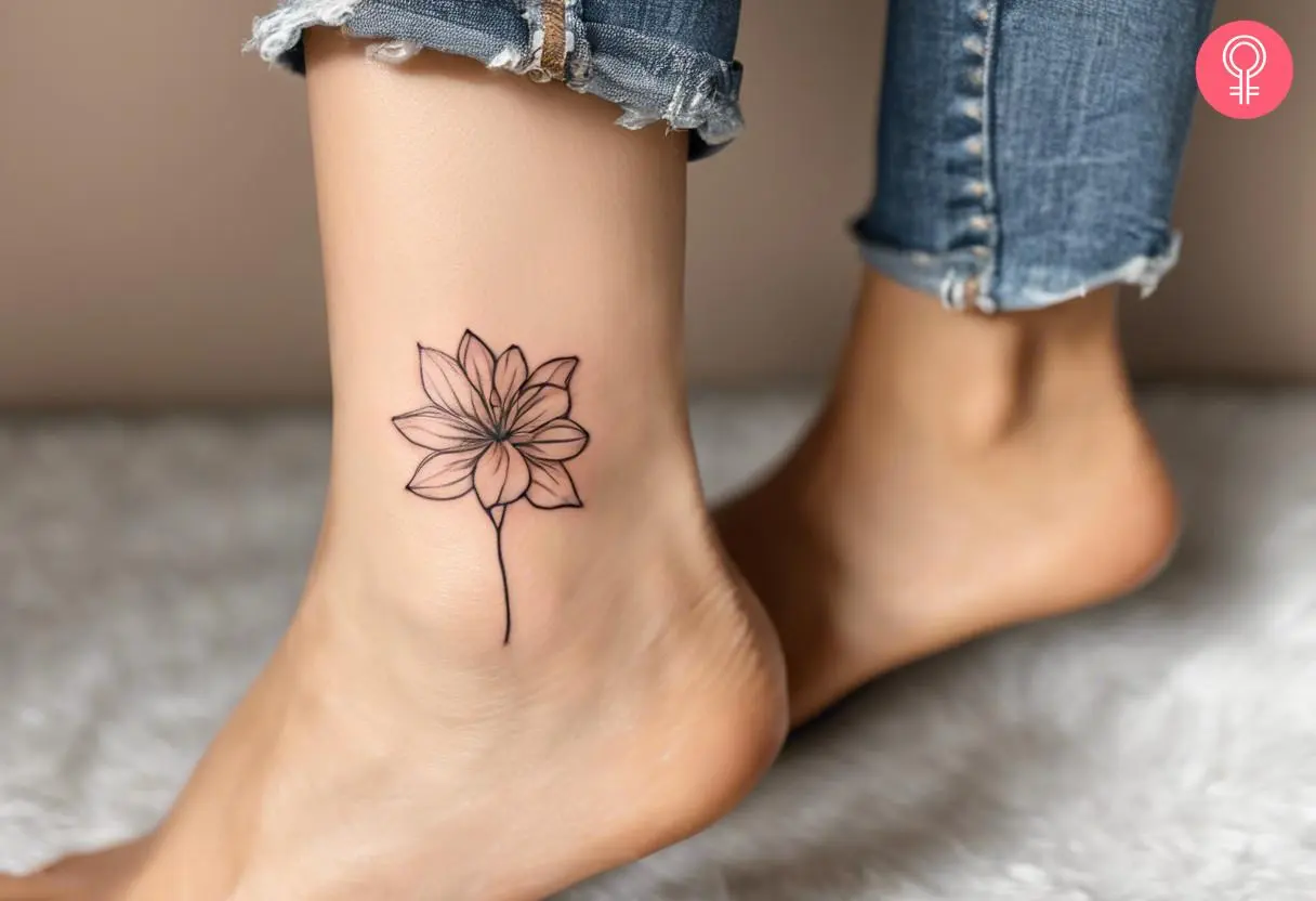 Freehand flower tattoo on the ankle