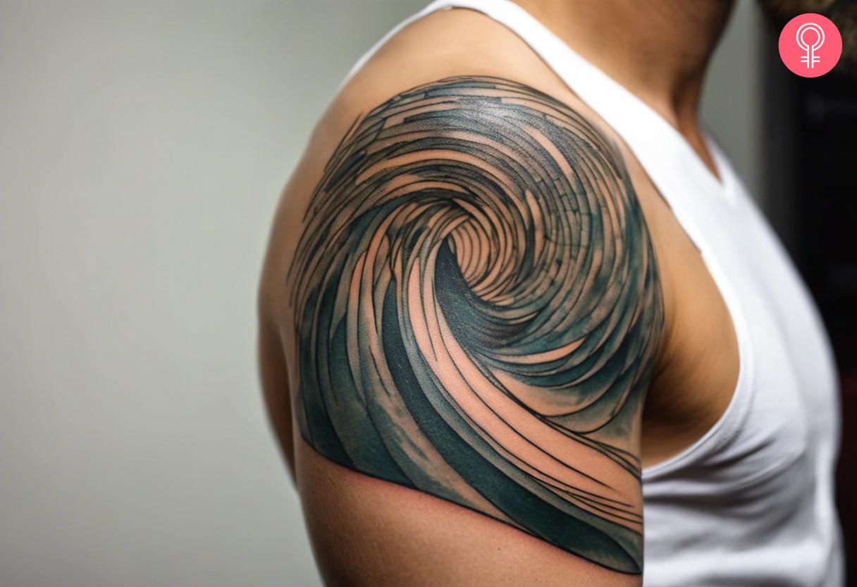 Freehand waves abstract tattoo on the upper arm