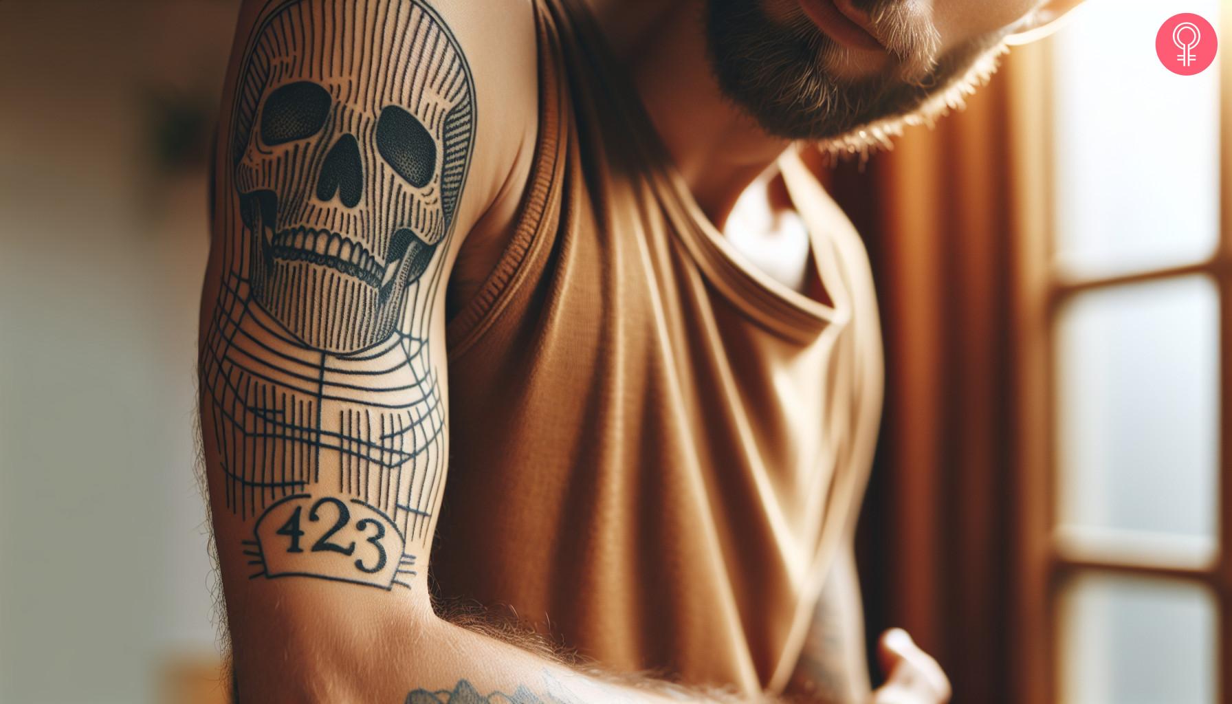 A gangster area code tattoo on the upper arm of a man