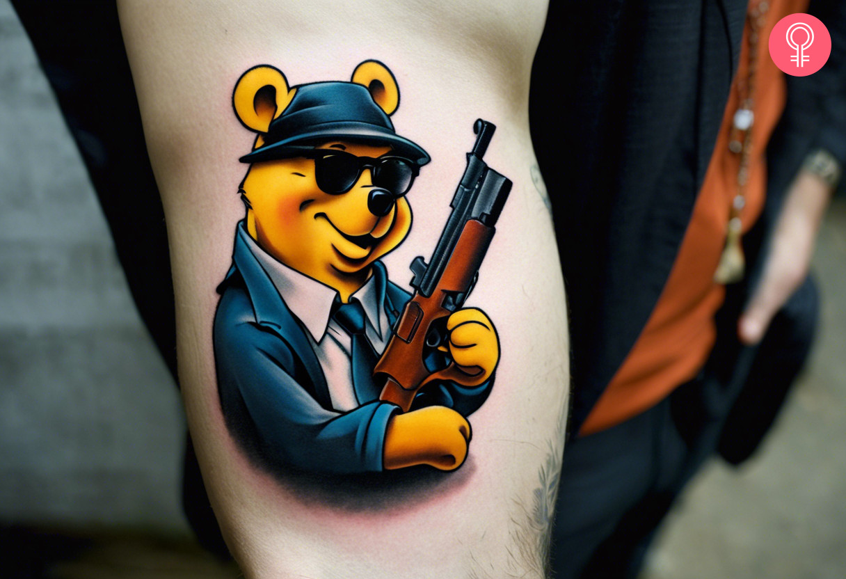 Gangster Winnie the Pooh tattoo on the forearm