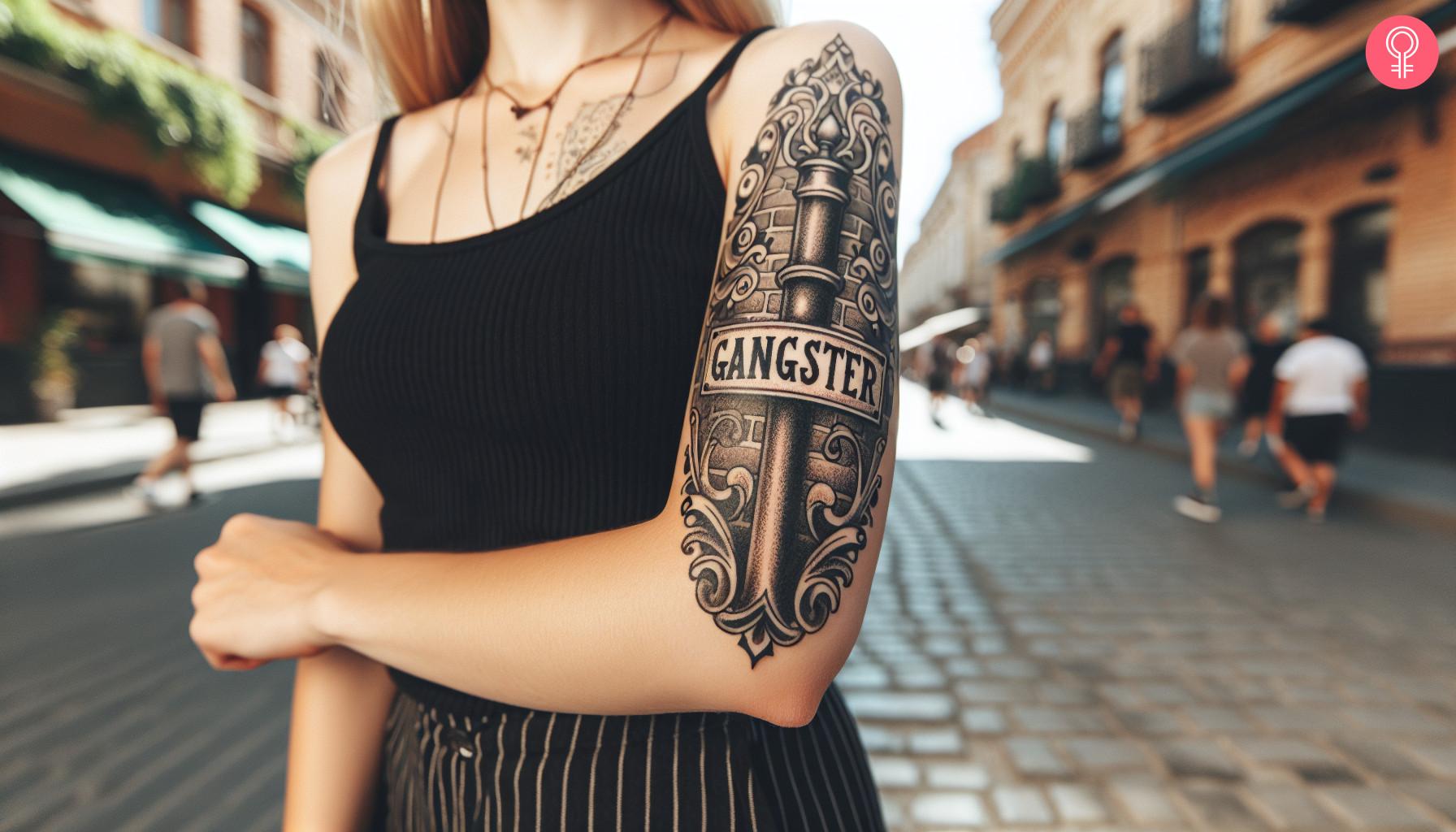 Gangster street sign tattoo on a woman's arm