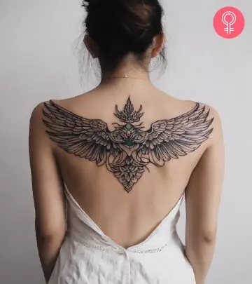 Woman with a Garuda tattoo on her back