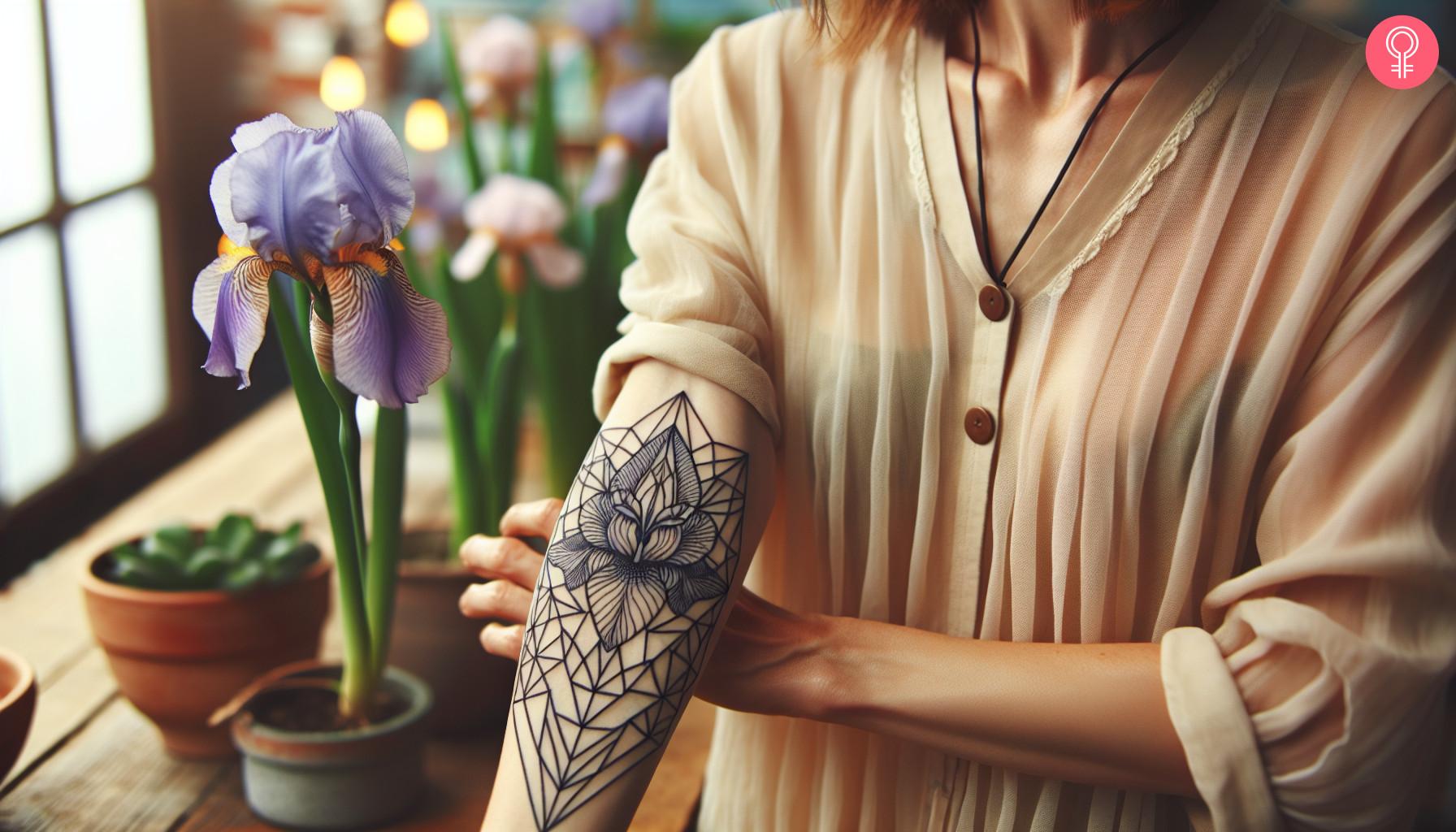 Geometric iris flower tattoo on a woman's arm