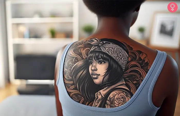 Girl with a bandana tattoo on the back shoulder