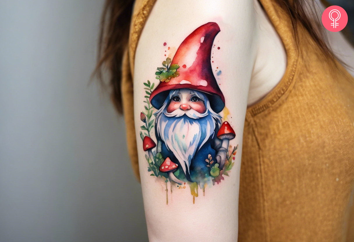 A gnome mushroom tattoo on the upper arm