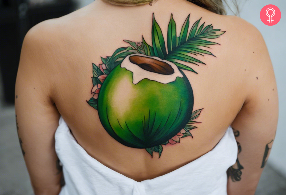 Green coconut tree tattoo on the back