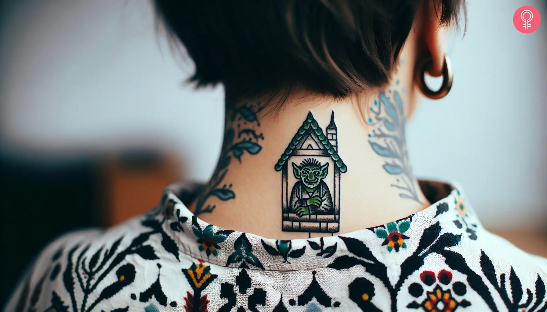 A green goblin tattoo on the back of the neck