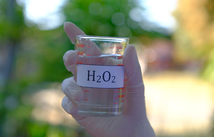 Close-up shot of hydrogen peroxide solution in a beaker