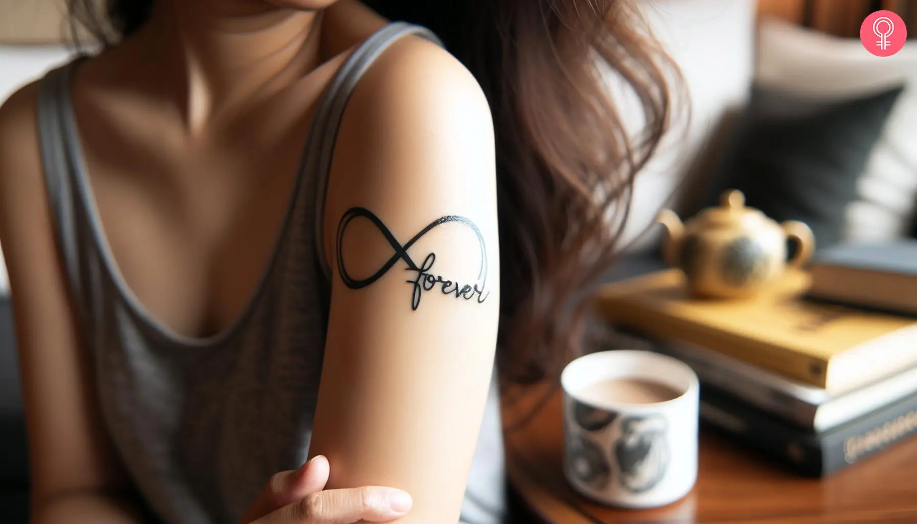 Infinity ‘forever’ tattoo on a woman’s arm