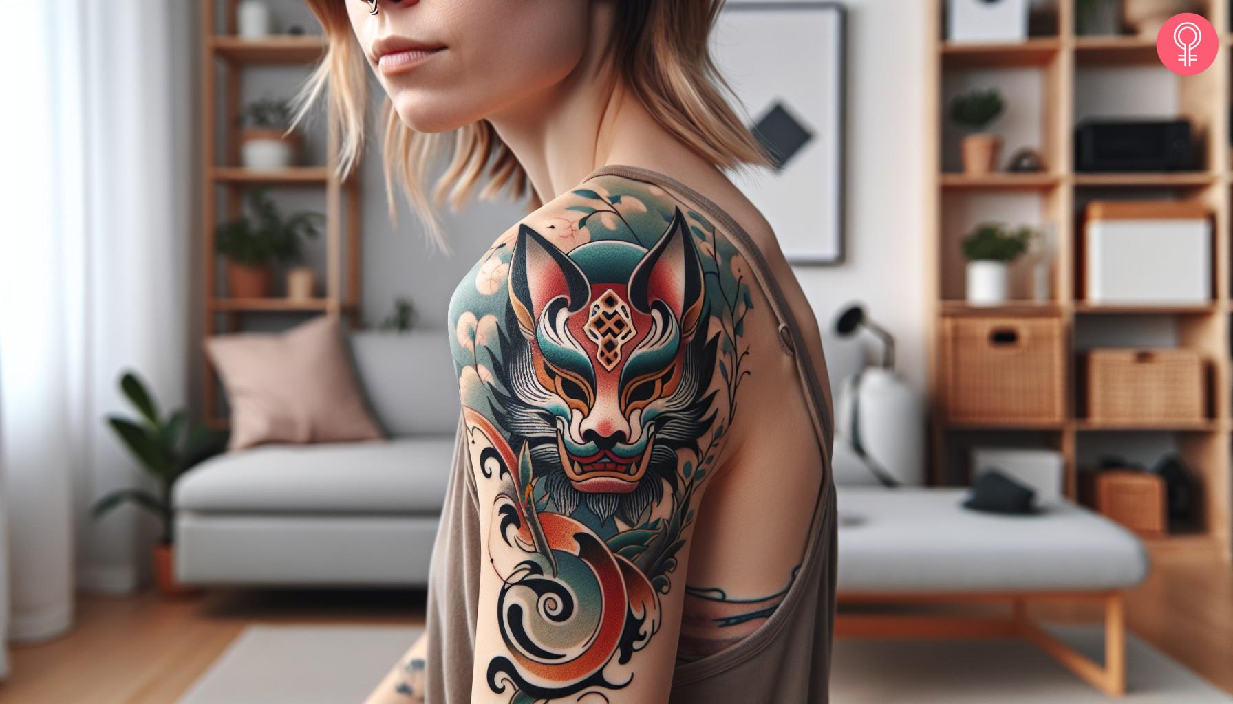 Japanese mask tattoo on arm