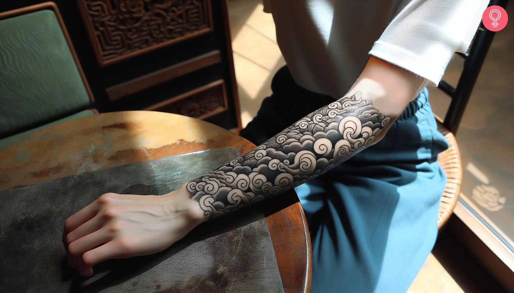 Japanese half-sleeve cloud tattoo on the forearm