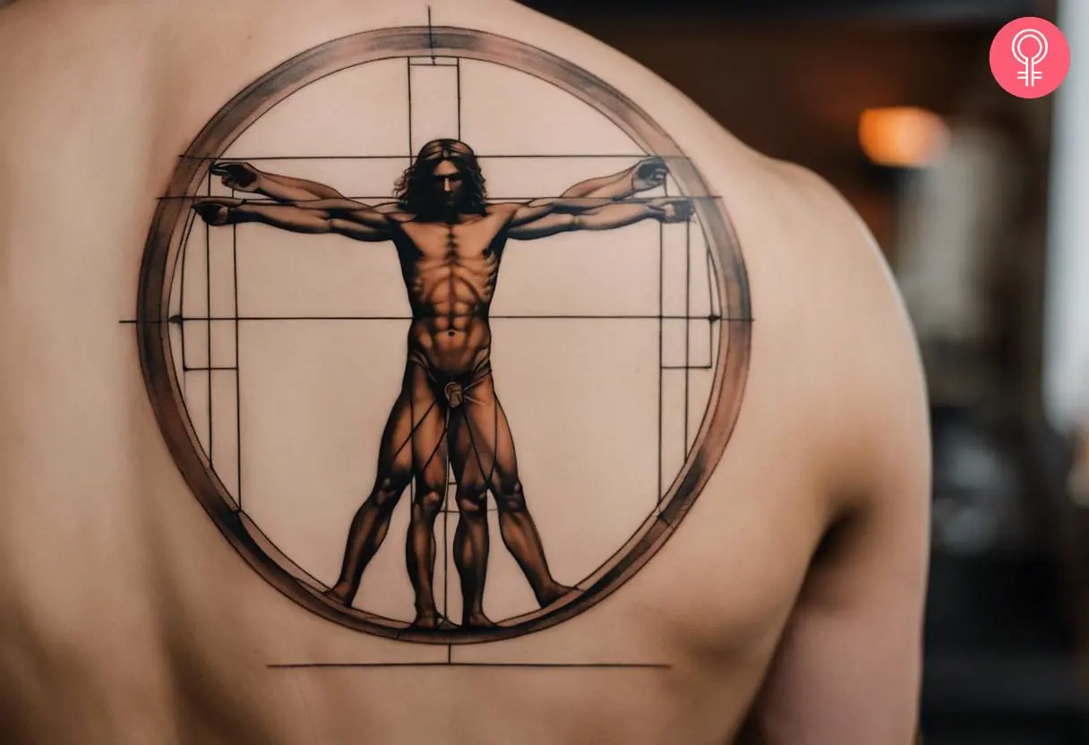 Leonardo da vinci vitruvian man tattoo on the back of the shoulder