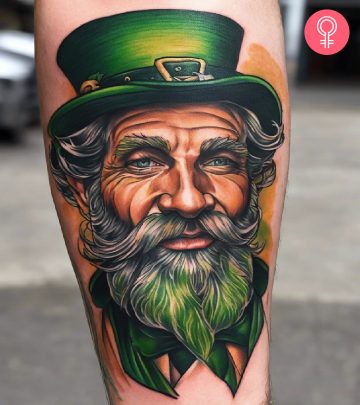 A four-leaf clover good luck tattoo on the arm