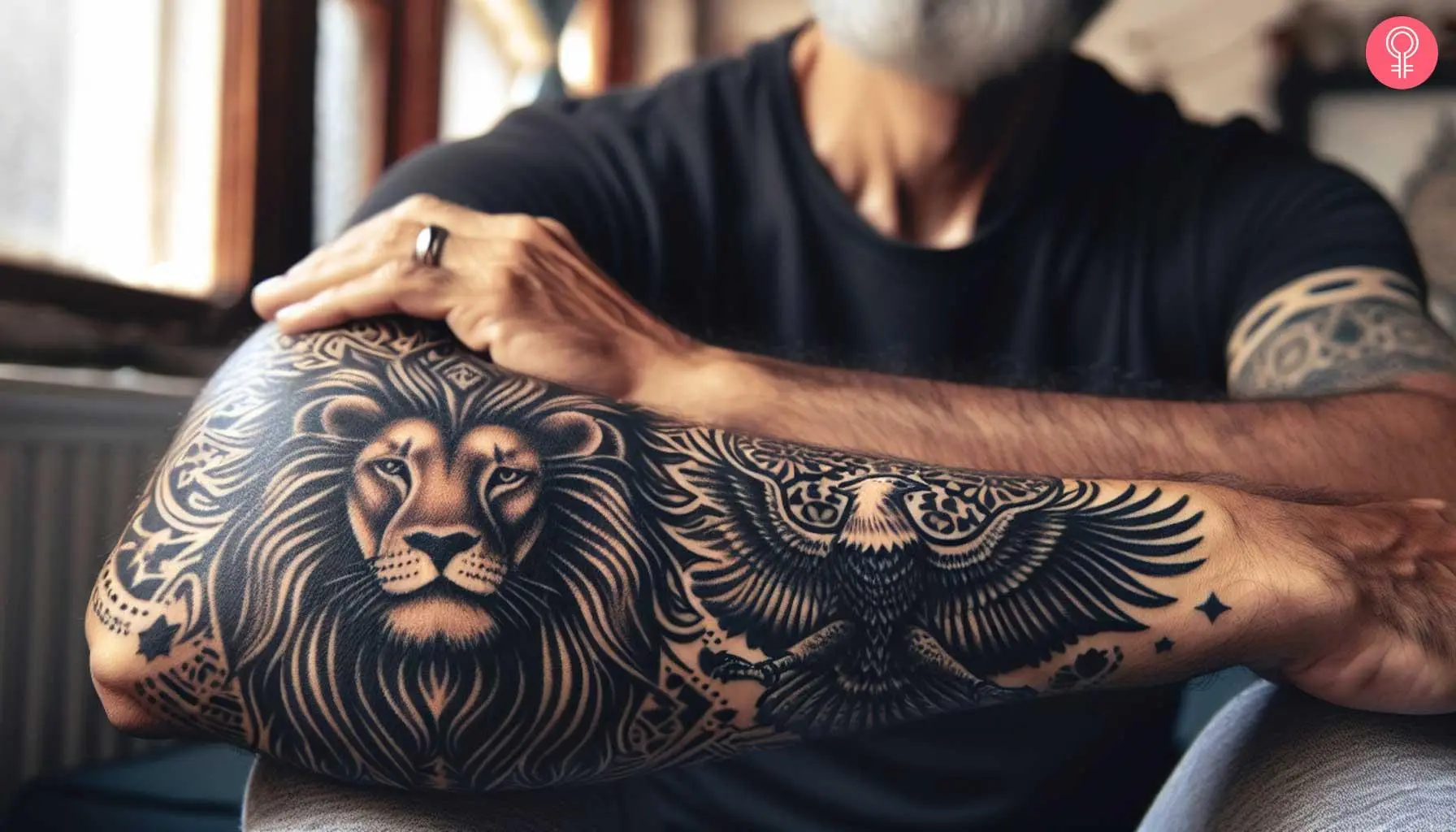 Lion and eagle tattoo on the forearm of a man