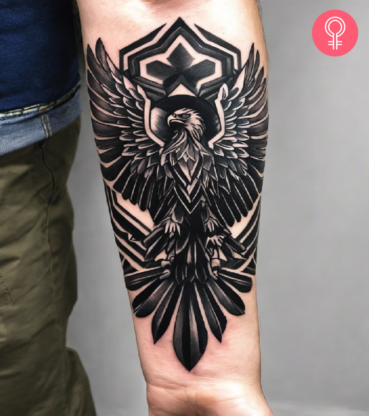 Man with a Polish eagle tattoo on the forearm