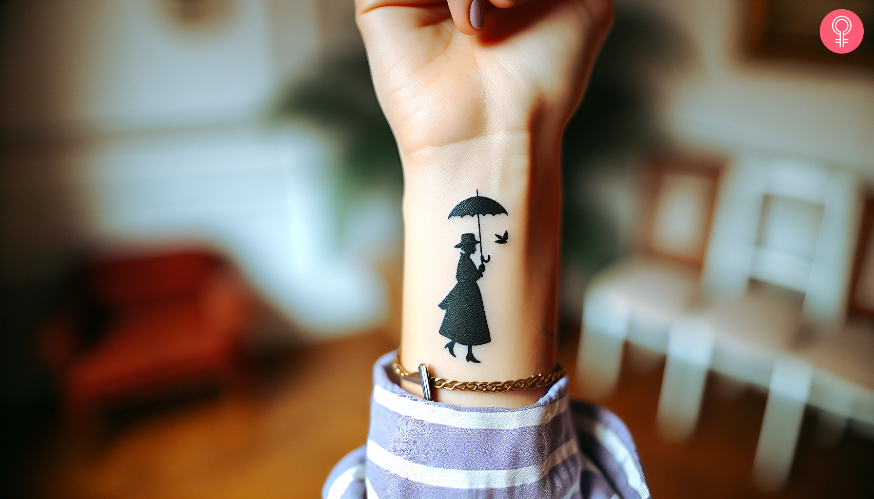 A woman with a small black Mary Poppins tattoo on her wrist