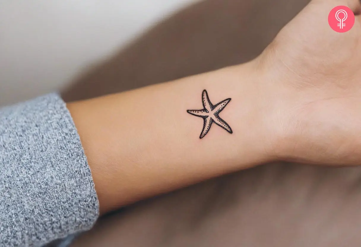 Minimalist starfish tattoo on the wrist