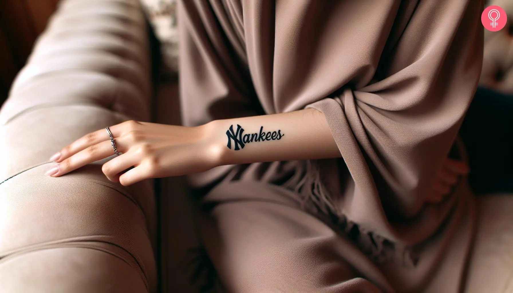 NY yankees tattoo on the forearm of a woman