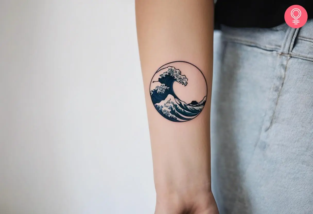 Ocean waves tattoo on the forearm